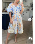 Oversized puff sleeve midi dress in Multi color floral print