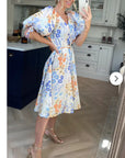 Oversized puff sleeve midi dress in Multi color floral print