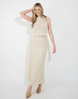 Pointelle knit vest top and maxi pleated skirt in beige