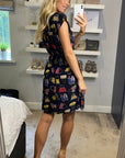 Scarf print A-line dress in black color