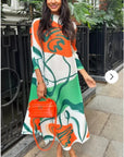 Multi Color Print Pleated Dress in three quarter sleeves in green and orange