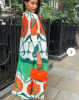 Multi Color Print Pleated Dress in three quarter sleeves in green and orange