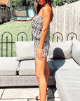 Textile print all over Cotton Playsuit in black color