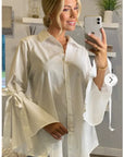 Bell sleeve shirt with ties in white