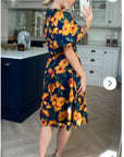 Oversized puff sleeve midi dress in Multi color floral print