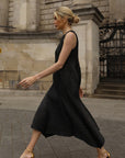 Sculptural Pleated Midi Dress with Structured Panels