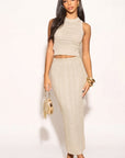 Pointelle knit vest top and maxi pleated skirt in beige