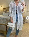 Oversized shirt dress in white with chiffon ruffle stripe design