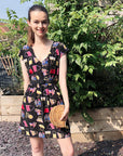 Scarf print A-line dress in black color