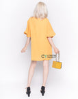 Top with Oversized Ruffle Sleeves in Mustard Yellow