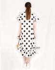 Polka Dot print dip hem dress with frill sleeves design in black white color