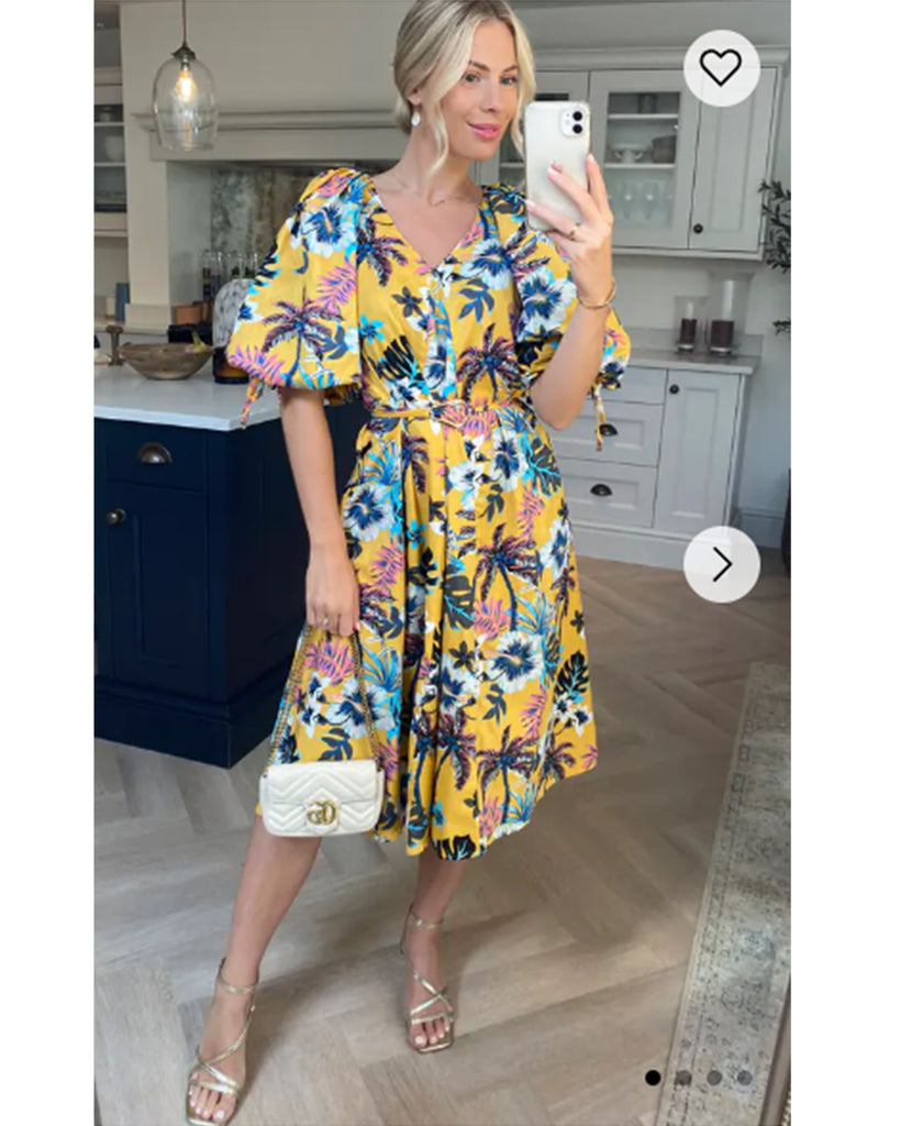 Oversized puff sleeve midi dress in Multi color floral print