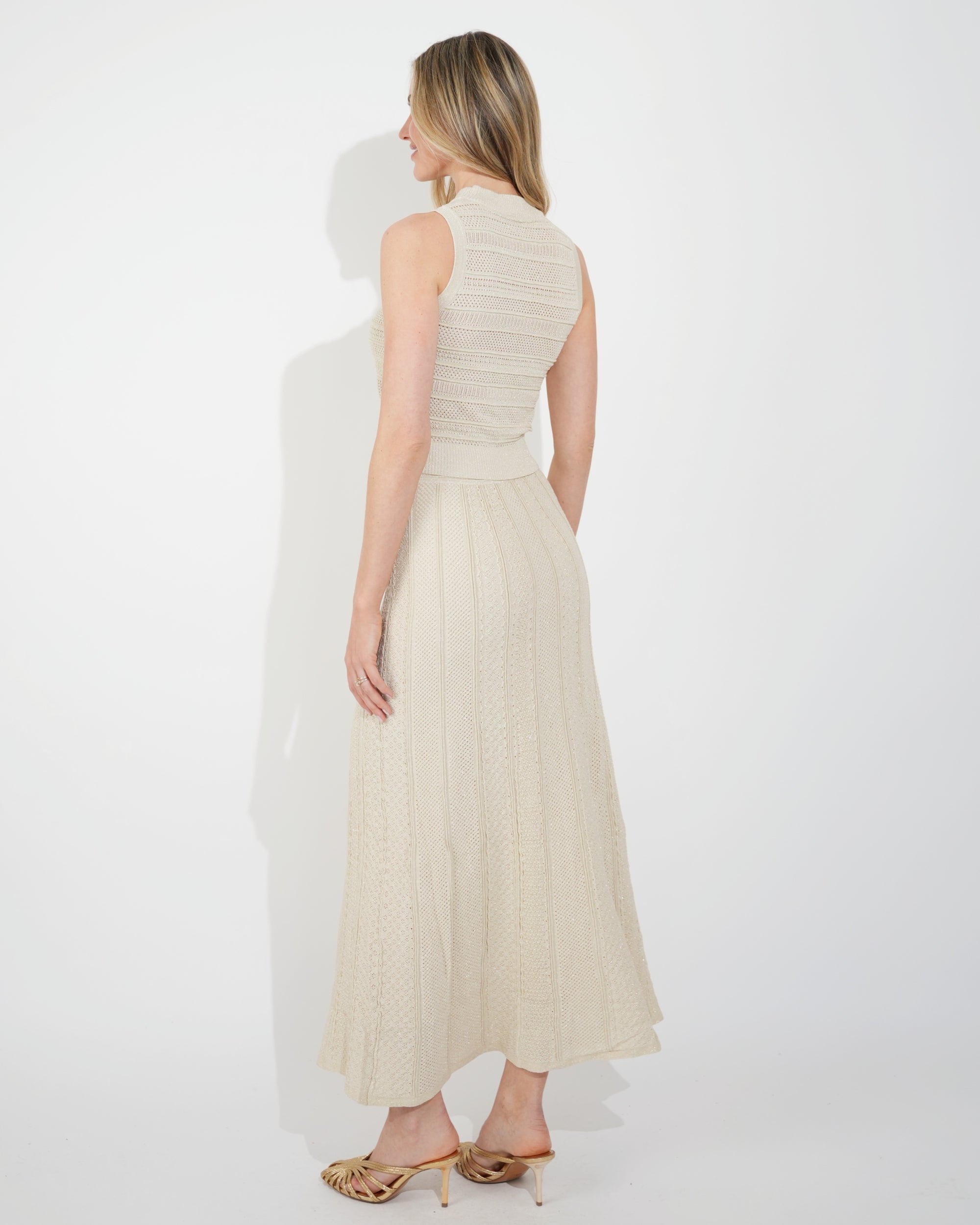 Pointelle knit vest top and maxi pleated skirt in beige