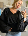 Puff sleeve smocked top in black