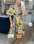 Oversized puff sleeve midi dress in Multi color floral print
