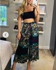 Palm tree and animal scarft print pleated trousers