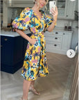Oversized puff sleeve midi dress in Multi color floral print