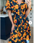 Oversized puff sleeve midi dress in Multi color floral print