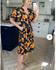 Oversized puff sleeve midi dress in Multi color floral print