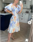 Oversized puff sleeve midi dress in Multi color floral print