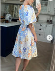 Oversized puff sleeve midi dress in Multi color floral print