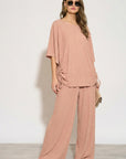 Oversized comfort stretch-jersey top and Relaxed-fit trousers in Black