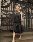 Sculptural Pleated Midi Dress with Structured Panels