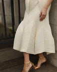 Sculptural Pleated Midi Dress with Structured Panels