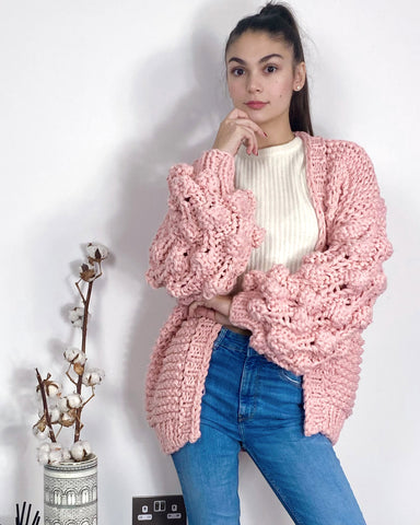 Hand knit cable design cardigan in pink