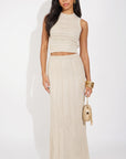 Pointelle knit vest top and maxi pleated skirt in beige