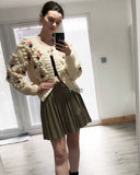 Floral design hand knit cardigan in cream color