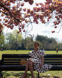 Polka Dot print dip hem dress with frill sleeves design in black white color
